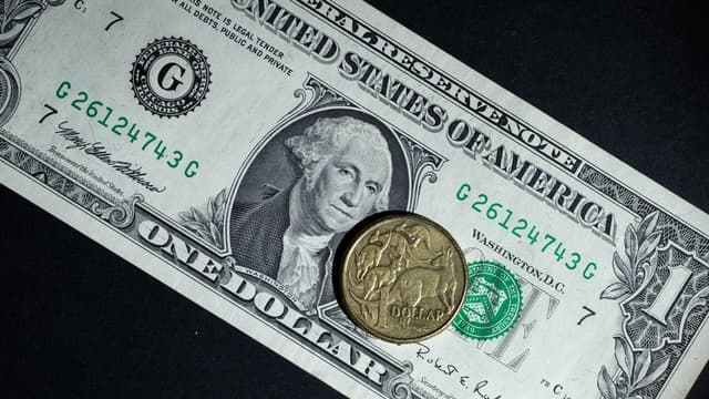 Aussie dollar breaks barrier as greenback loses shine