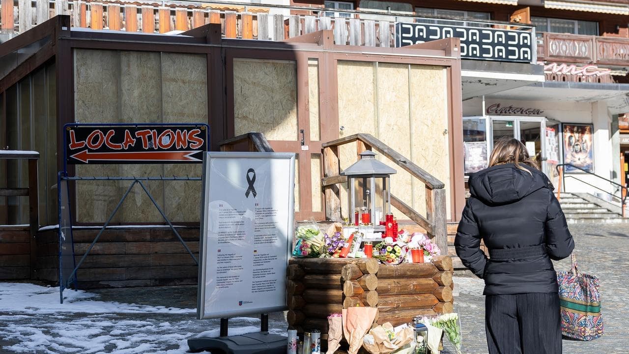 Swiss prosecutors widen fire probe to local authorities