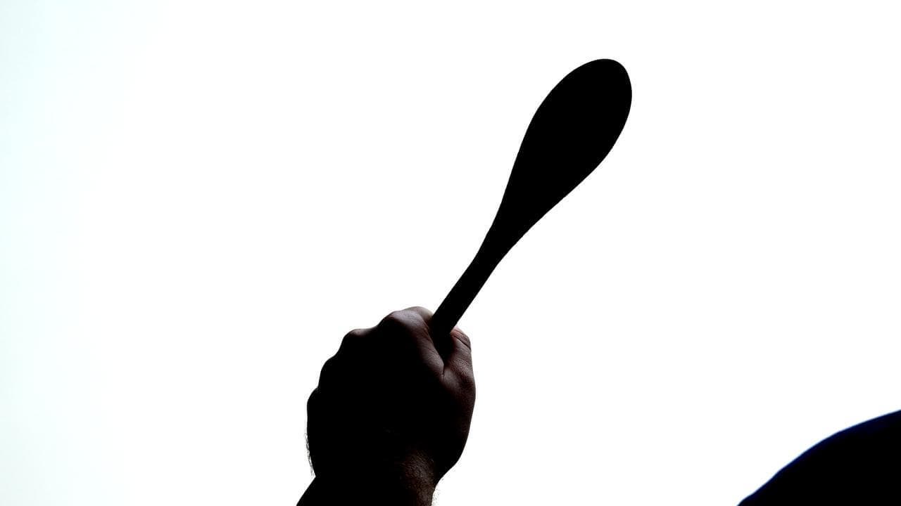 Nurse banned after hitting step-child with wooden spoon