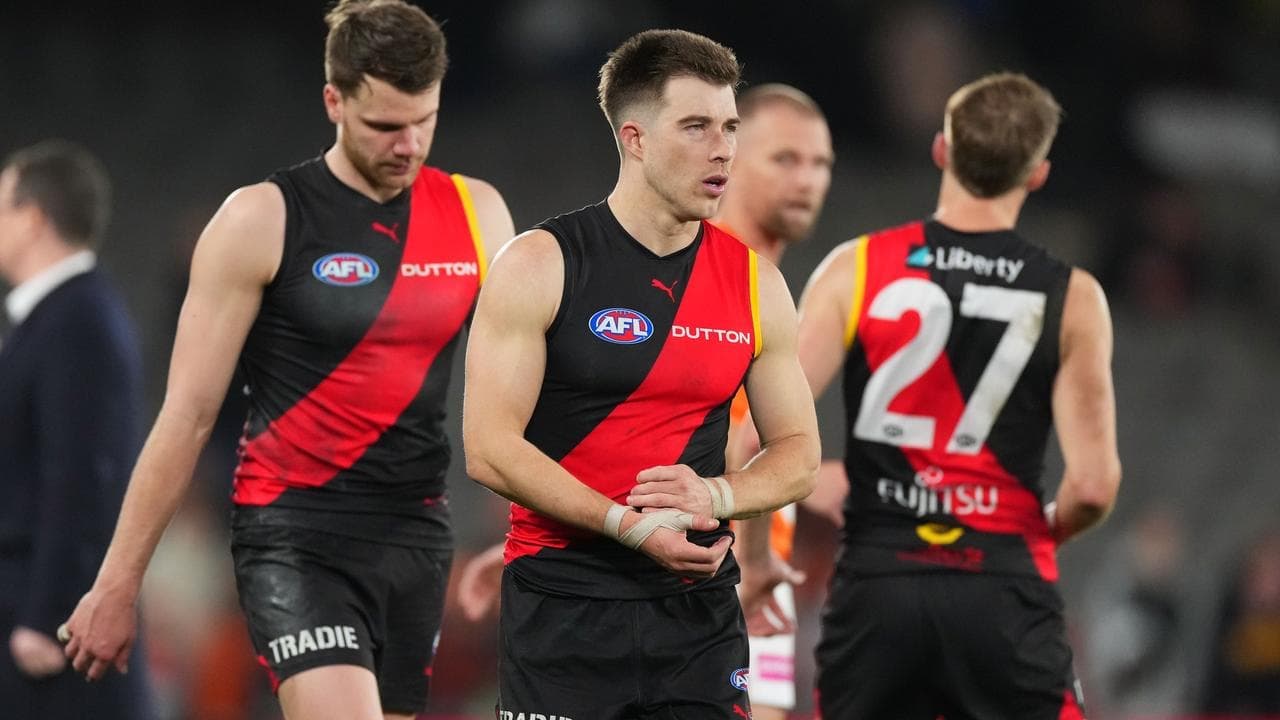 Merrett misses Essendon's team photo because of illness