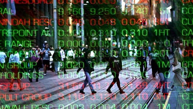 Australian shares reverse early dip as miners soar