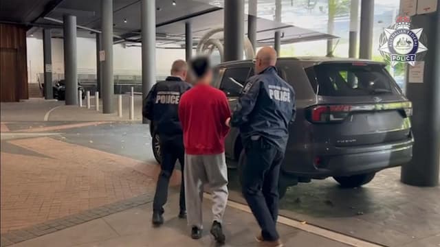 Two Chinese nationals charged over alleged spy ring