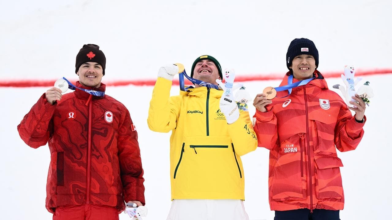 Moguls master Woods snatches gold medal for Australia