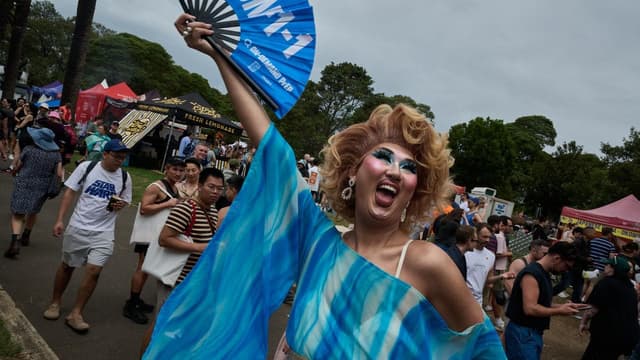Grey skies can't deter colourful Mardi Gras crowd