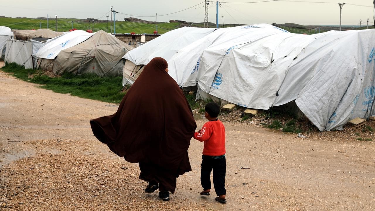 Australia says IS fighters' families not welcome back