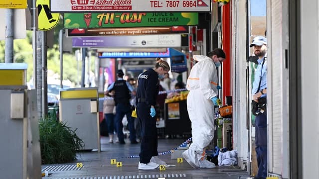 One dead in 'random' triple stabbing on high street