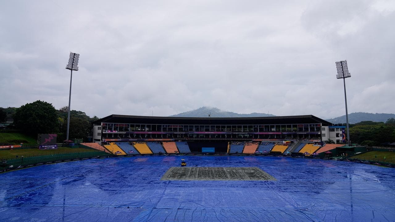 Australia exit World Cup as rain sends Zimbabwe through