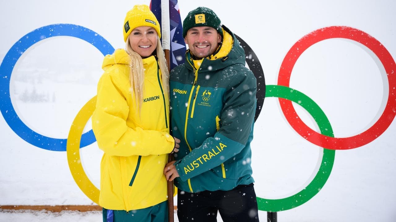 Medal-winning Woods and Scott given Aussie flag honours