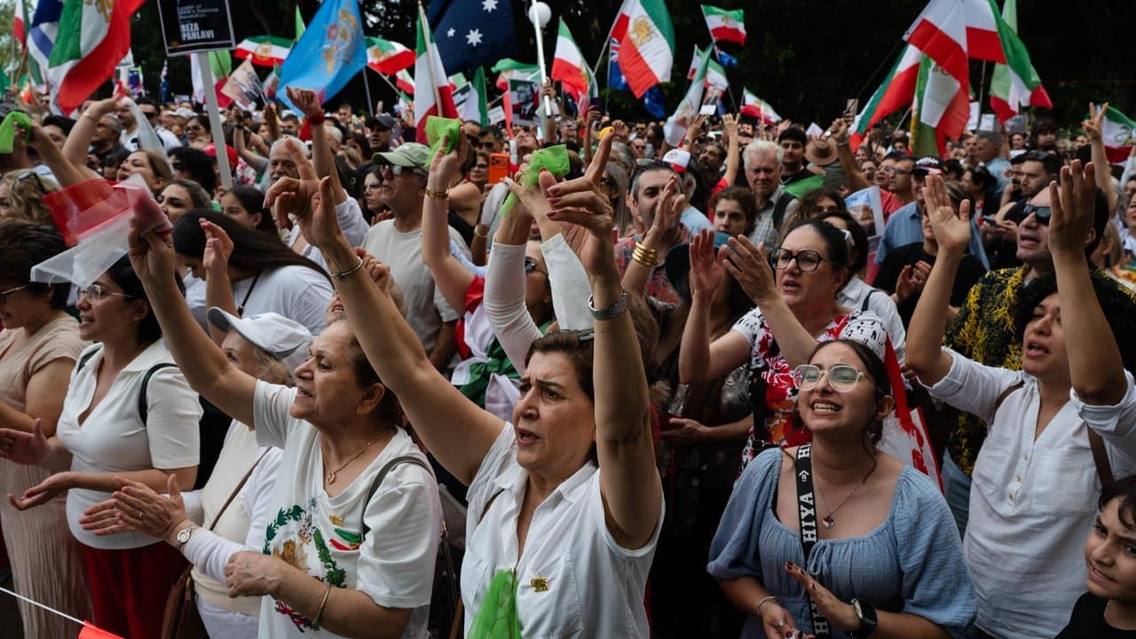 Iranians celebrate as PM warns of limited assistance