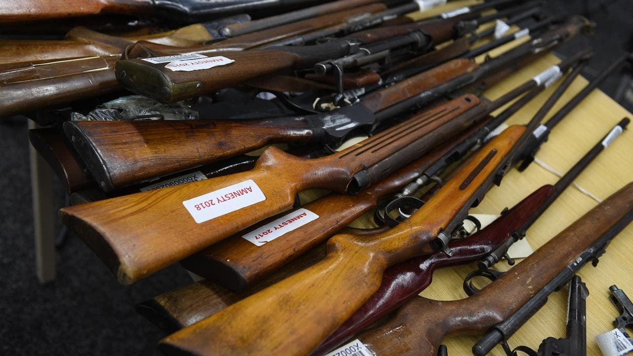 Union boss charged after police find 167 guns and cash