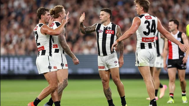 Collingwood open AFL season with tight win over Saints