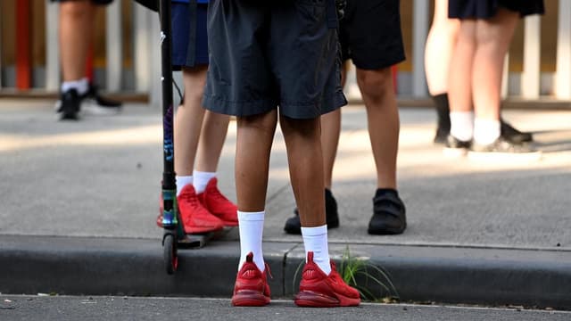 Four teachers charged with assaulting young students