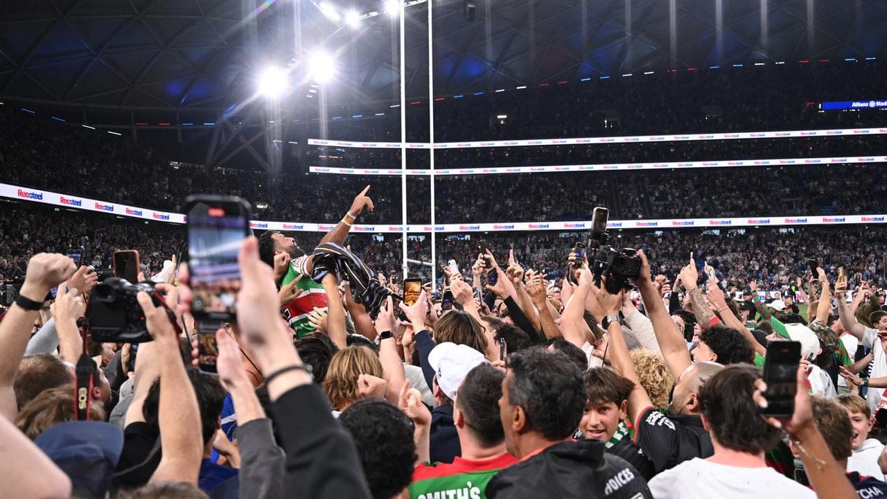 NRL fans rush field for Alex Johnston's historic moment