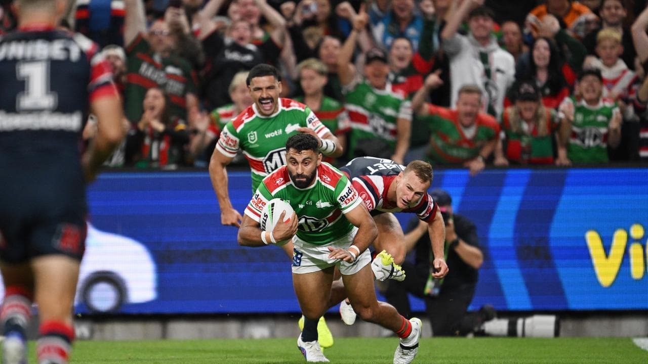 Johnston breaks NRL try-scoring record, fans rush field