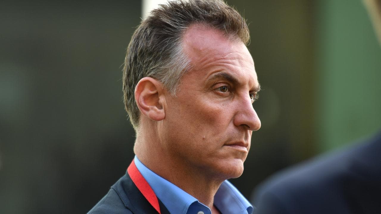 Media mogul placed on leave after violence allegations