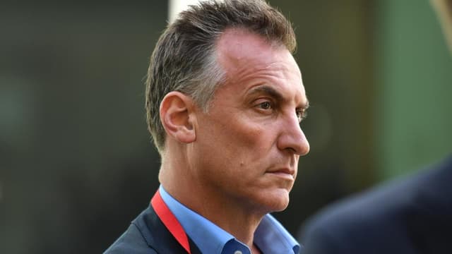 Media mogul placed on leave after violence allegations