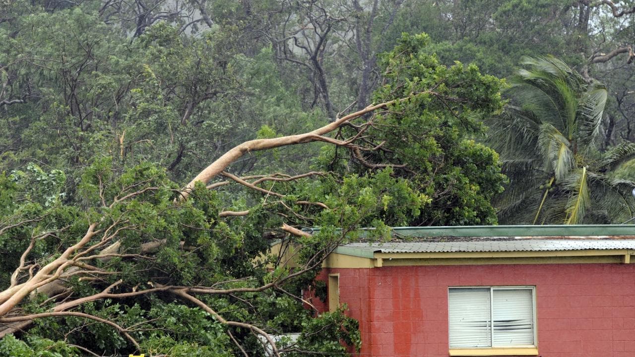 Locals await fury as cyclone upgraded to category five