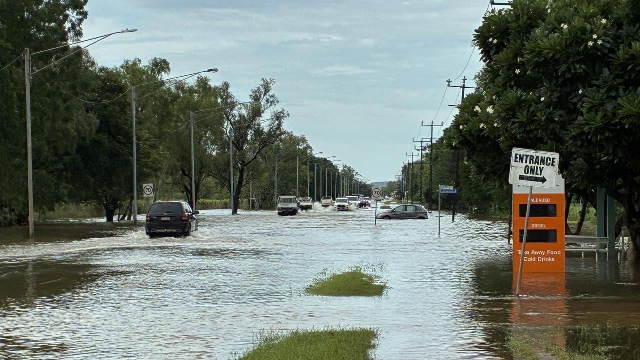 'We have to face it': flood-struck town waits for storm