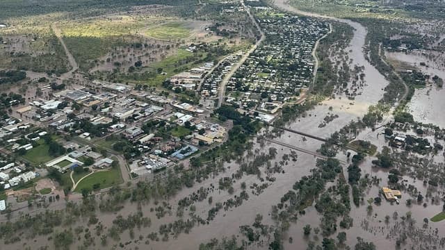 Towns brace for fresh floods as ex-cyclone lashes north