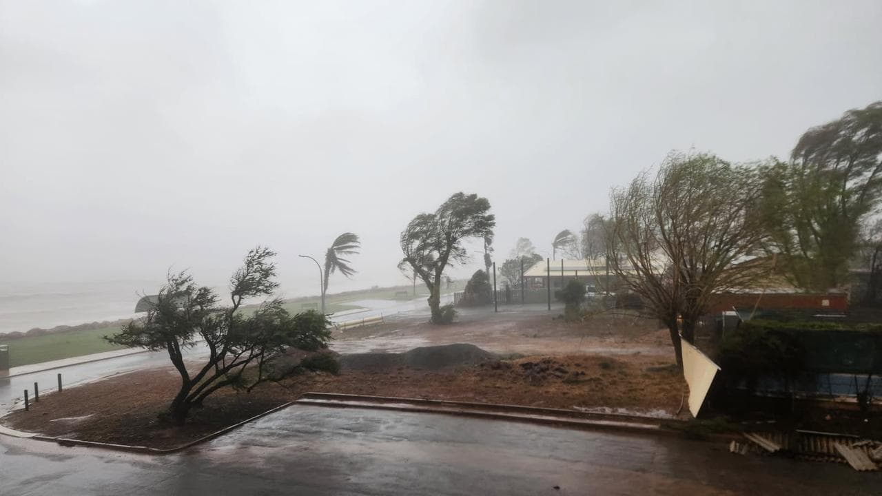 'Too late to leave': cyclone weakens but hazards remain