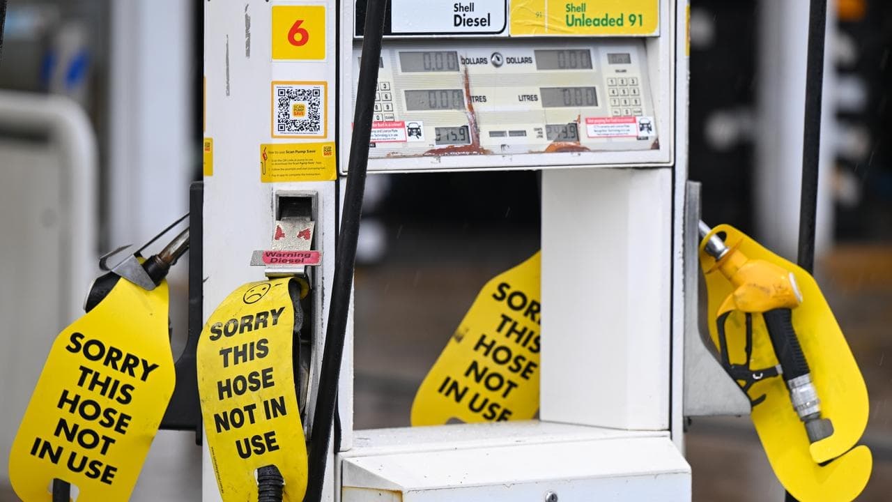 Embattled motorists win bowser relief as taxes slashed