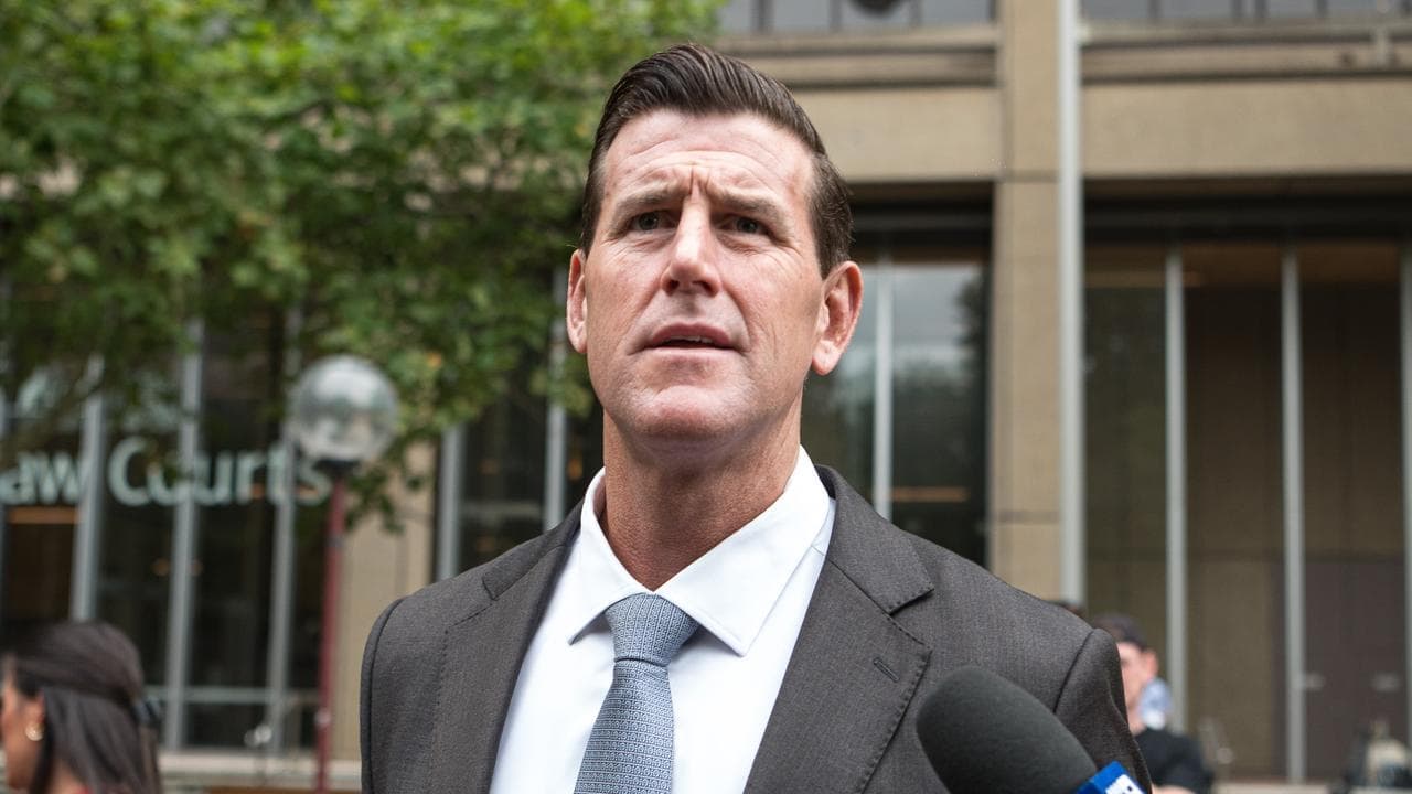 Roberts-Smith to front court after night spent in cell