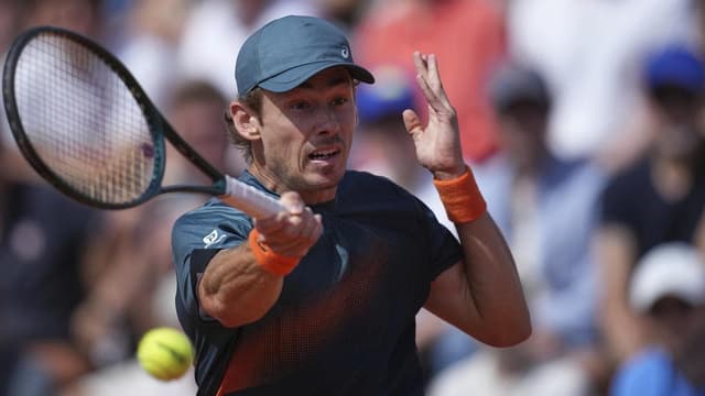 Gritty De Minaur takes revenge on Norrie