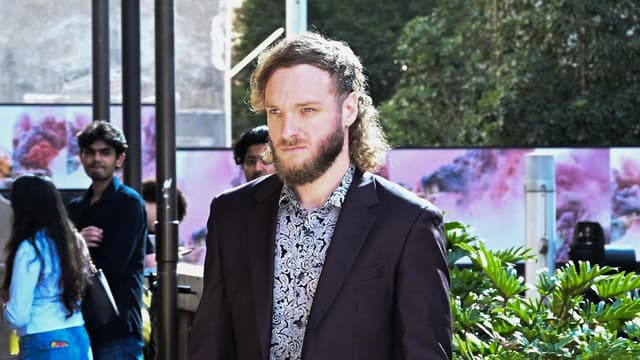 Bailed neo-Nazi's call to free accused war criminal