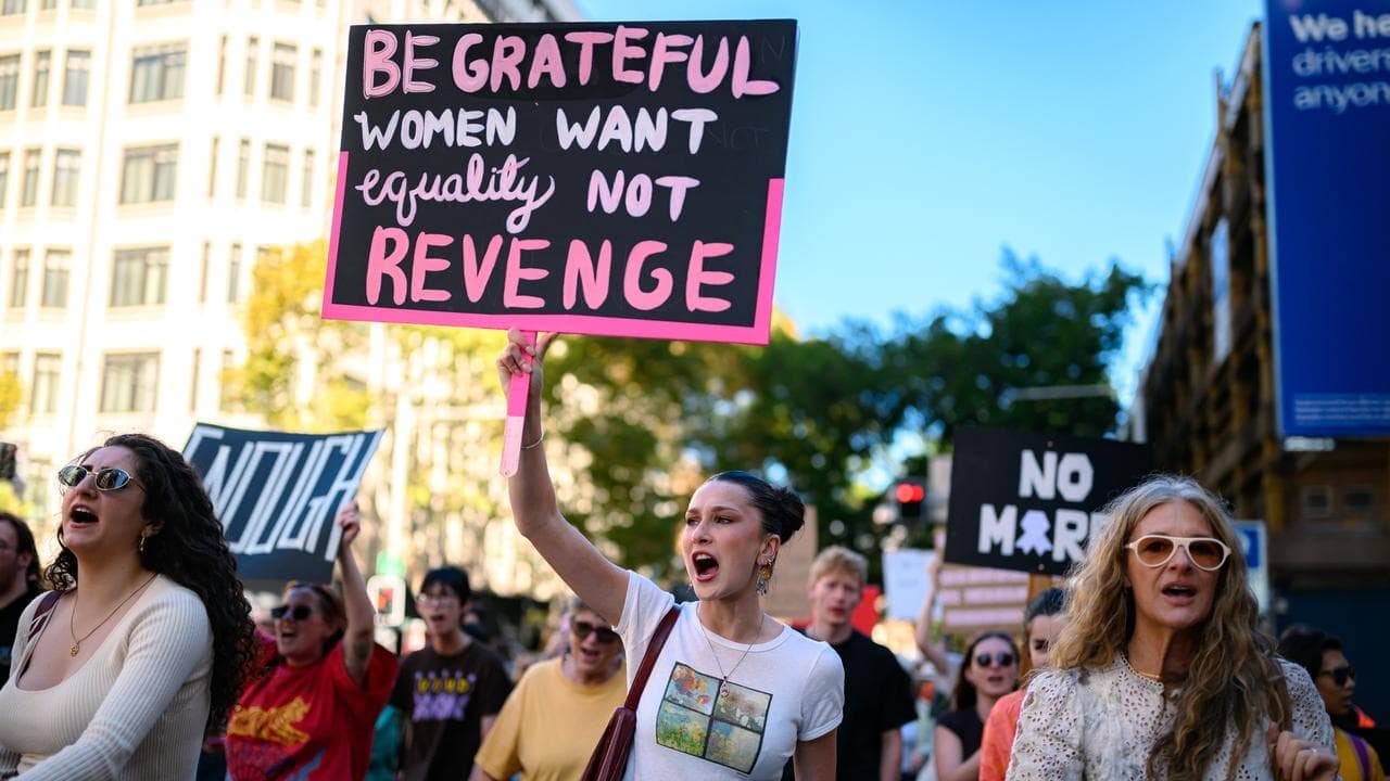 Thousands march in calls to end domestic violence