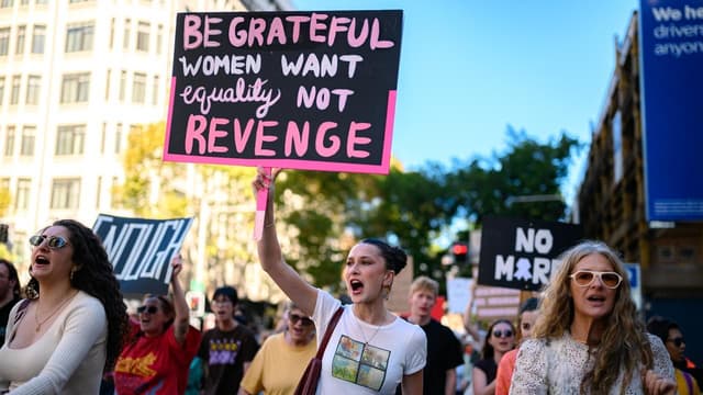 Thousands march in calls to end domestic violence