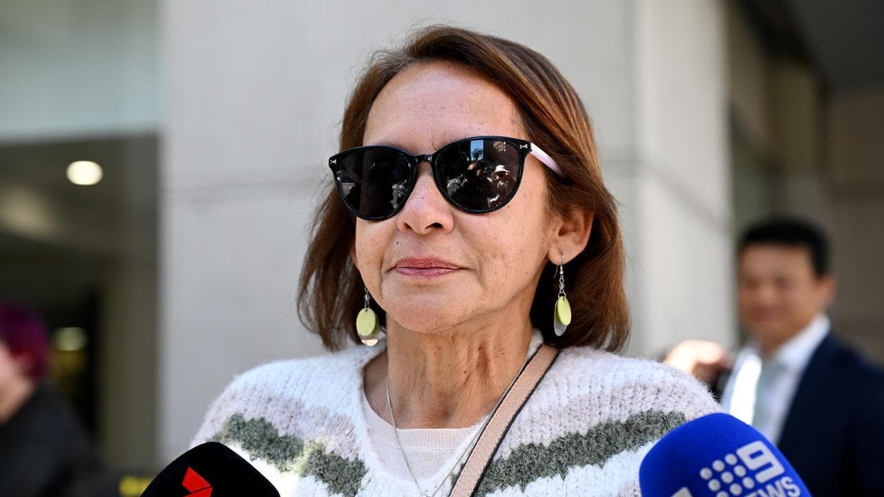 Alleged killer cop's mum charged with witness influence