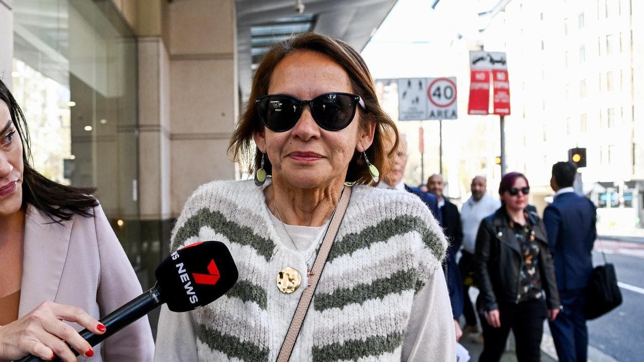 Accused killer cop's mum to remain behind bars for days