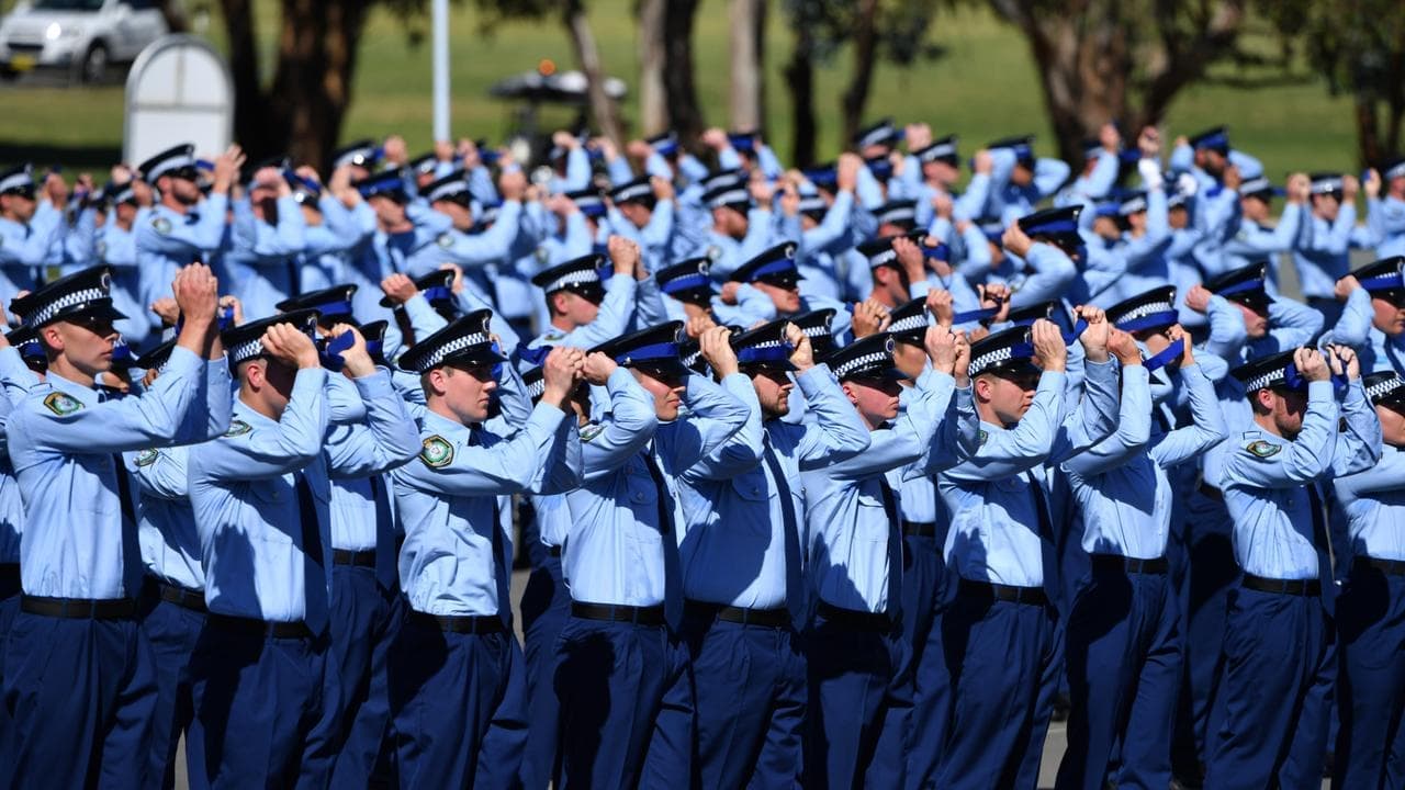 Police force under scrutiny swells ranks with recruits