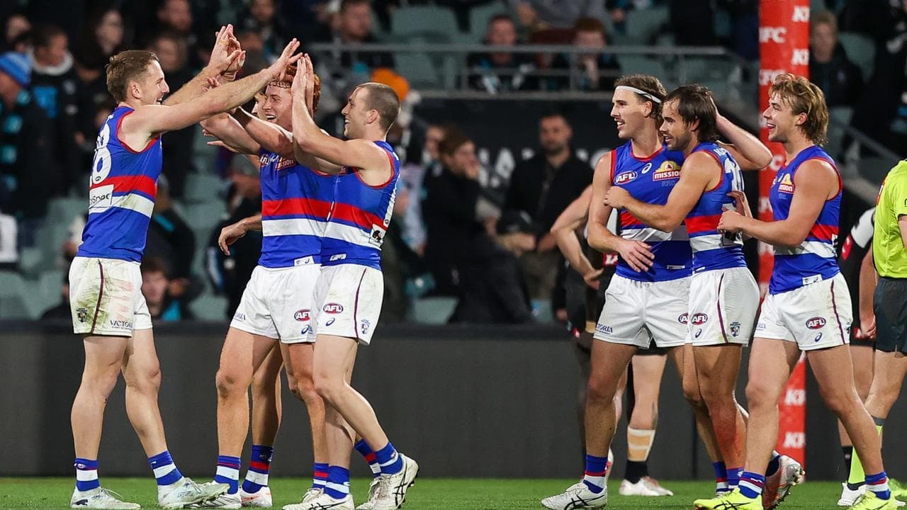 Bulldogs scrap to tense win over Port in AFL thriller