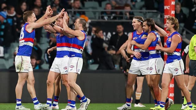 Bulldogs scrap to tense win over Port in AFL thriller