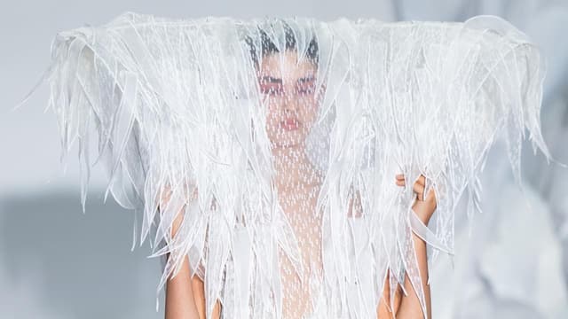 Designer makes triumphant runway return at fashion week