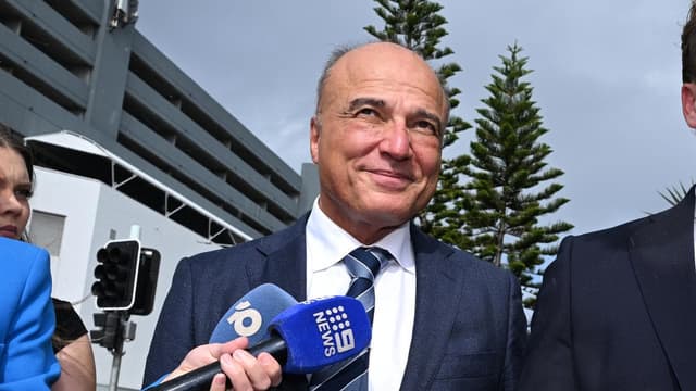 Ex-premier's partner banned from contact in rape case