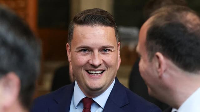 UK minister quits and calls for contest to oust Starmer