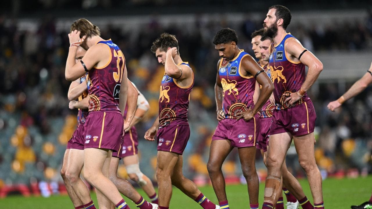 Lions suck for air after Cats keep feet in wet