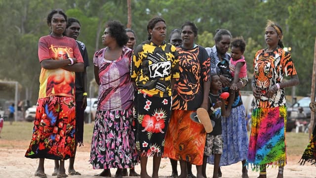 Next-generation Indigenous women flying employment flag