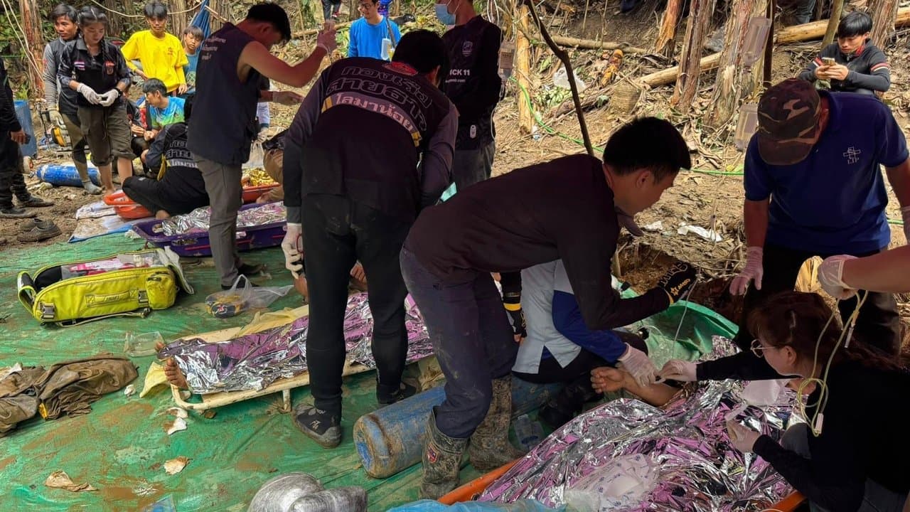 Four rescued from flooded Laos cave, two still missing