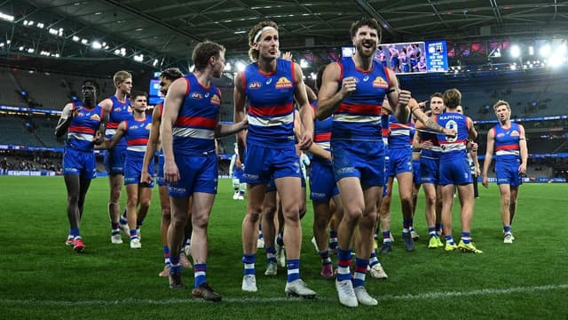 Dogged defender pips Pies with mark of a champion