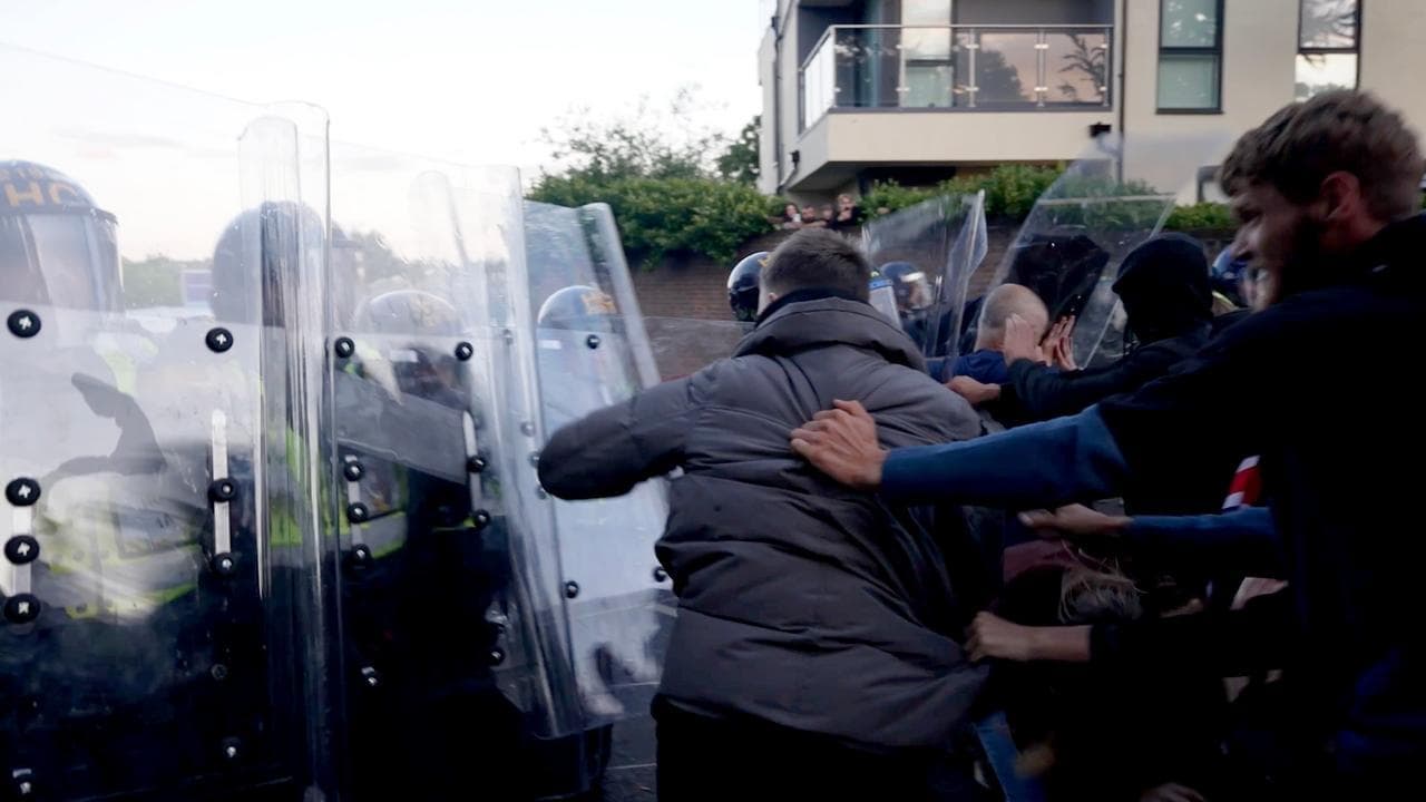 UK government condemns riot over teen's stabbing death