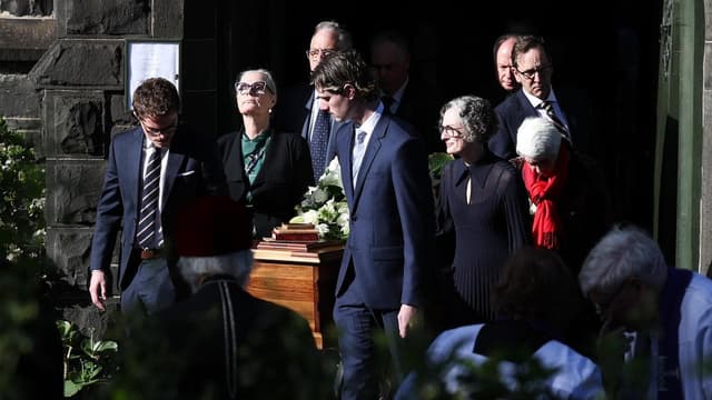 'Dark shadow' recalled at ex-governor-general's funeral