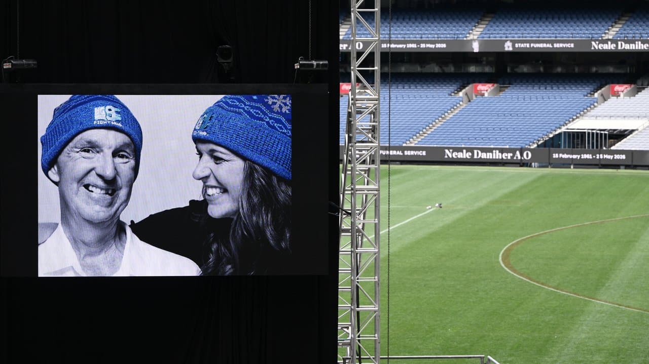 'Hero': AFL legend, MND crusader mourned by thousands