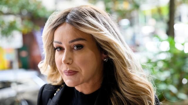 Miss Universe fashion designer cleared of blackmail
