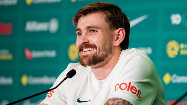 Socceroo still buzzing after sliding into history books