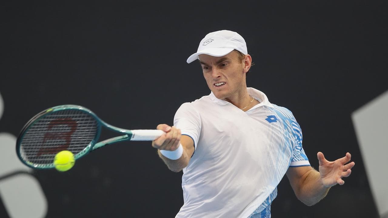 Hot stuff: Aussie ends Brit star's career at Wimbledon