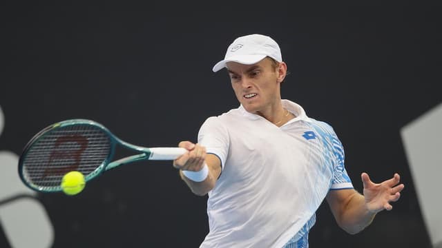 Hot stuff: Aussie ends Brit star's career at Wimbledon