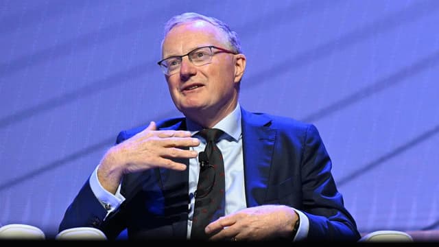 Treasurer responds after budget attack by ex-RBA head